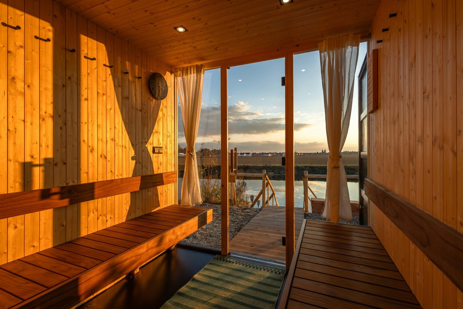 Modern home sauna with glass panels